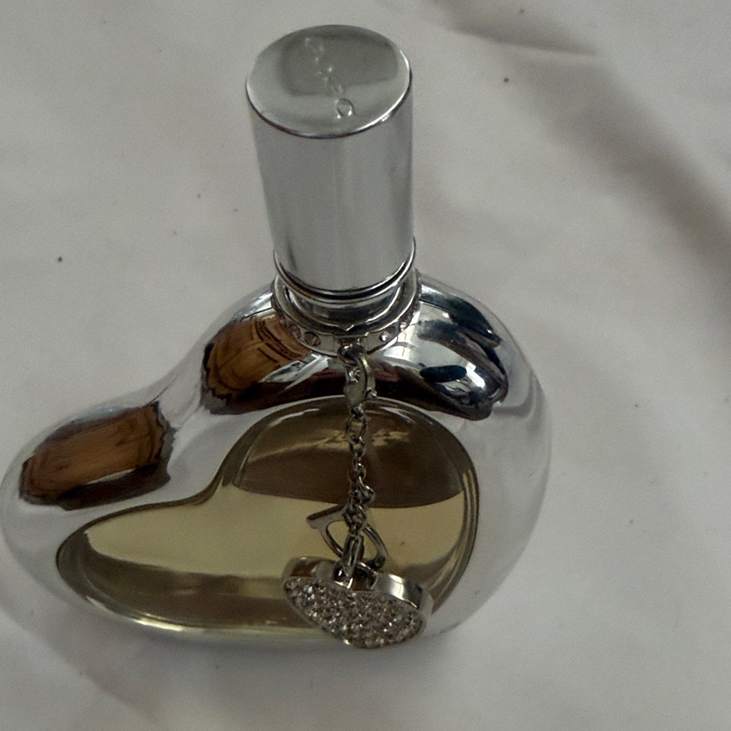 Bebe 34 Oz Perfume With HeartShaped Silver Perfume Bottle  Charm